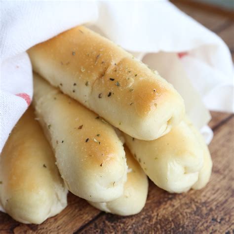 To make soft garlic breadsticks, you knead a yeast dough together until soft and stretchy. {So much better than} Olive Garden breadsticks recipe - It ...