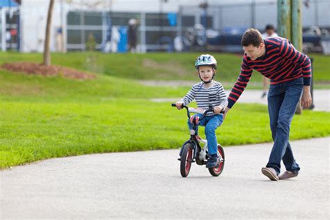 A Parents Training Wheels For Teaching Your Kid To Ride A Bike The