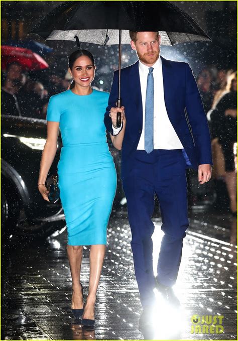 These Photos Of Meghan Markle And Prince Harry Walking In The Rain Look