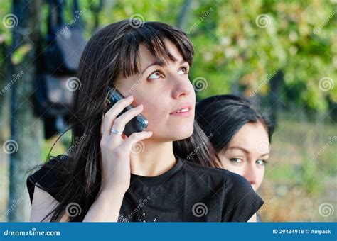 Young Woman Waiting For A Mobile Call Stock Photo Image Of Listening
