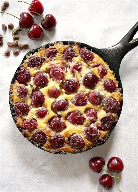A baked dessert composed of a layer of fresh fruit topped with a thick batter. Chocolate Chips and Cherry Clafoutis - My Gorgeous Recipes