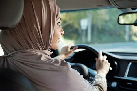 Premium Photo Woman In Hijab Driving Car