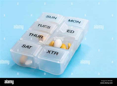 Pill Organizer With Variety Of Pills And Supplement Weekly Pill