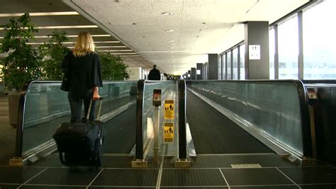 Moving walkways make you feel like you are superhuman. People On a Moving Walkway Stock Footage Video (100% ...