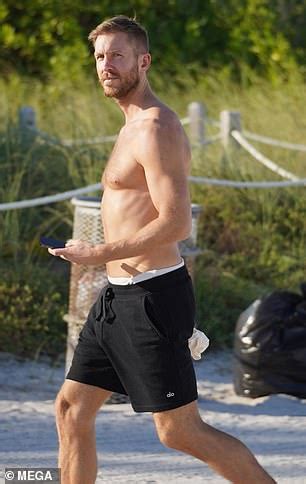 Shirtless Calvin Harris Shows Off His Bronzed Ripped Physique On Miami Beach Daily Mail Online