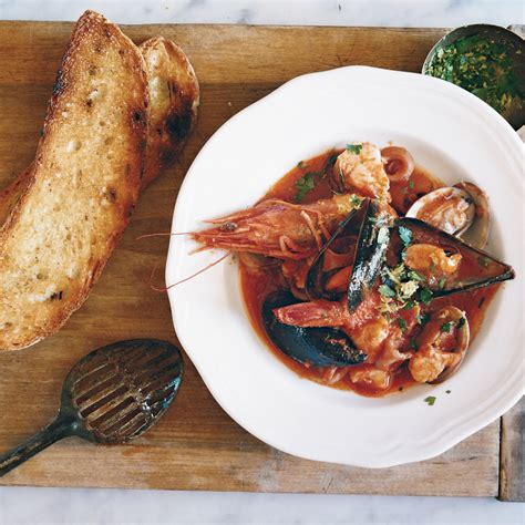 This recipe for cioppino seafood stew makes a hearty meal for seafood lovers. Italian Seafood Stew Recipe - Marco Canora | Food & Wine