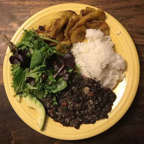Puerto rican chicken and rice, or arroz con pollo, is a classic dish to serve with fried plantains. homemade puerto rican rice & beans, fried plantains, and ...