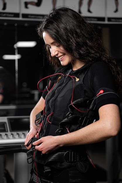 Premium Photo Girl In Ems Suit In Gym Sport Training In Electrical