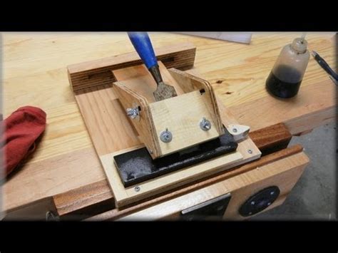 Lawn mower blade sharpening jig how to sharpen a hatchet or axe to a scary sharp edge! DIY lawnmower blade sharpening jig fixture | FunnyDog.TV