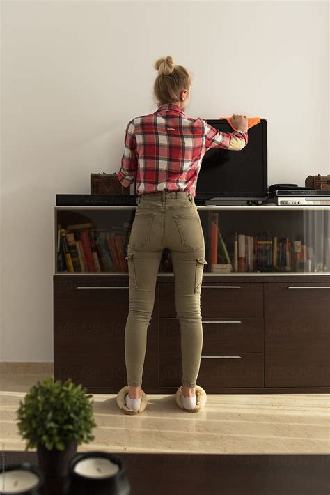 Woman At Home Doing Cleaning By Stocksy Contributor Milles Studio