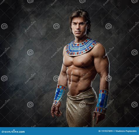 Strong And Athletic Man In Egyptian Costume With Blue Bracelets Stock Image Image Of Costume
