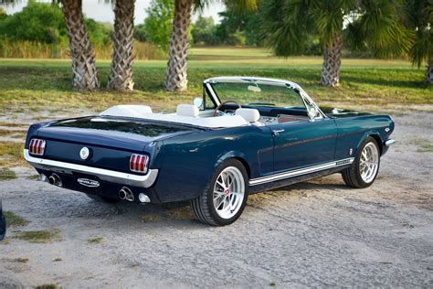 It had 83,000 miles and was restored. 1966 Mustang GT Convertible - Revology Cars