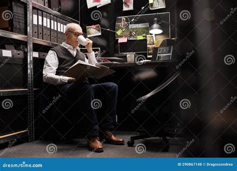 Elderly Private Detective Checking Mysterious Missing Case Stock Photo