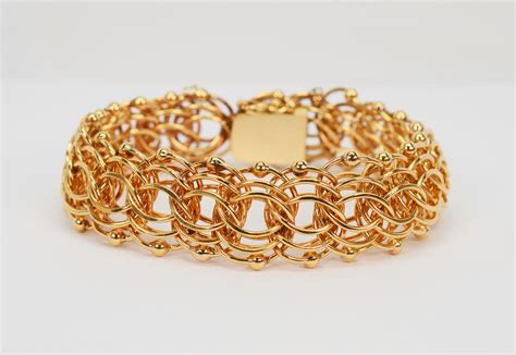 Triple Woven Link Retro 14 Karat Yellow Gold Charm Bracelet For Sale At