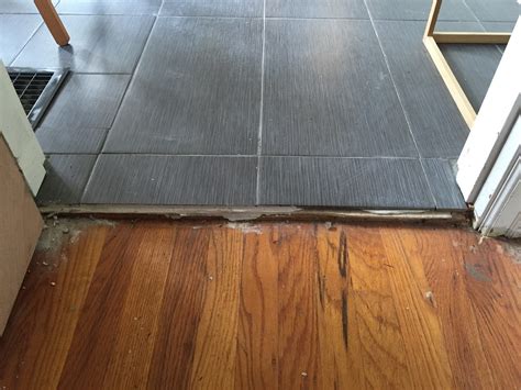 Flooring How Do I Transition From A Wood Floor To Tile That Has A 1 1