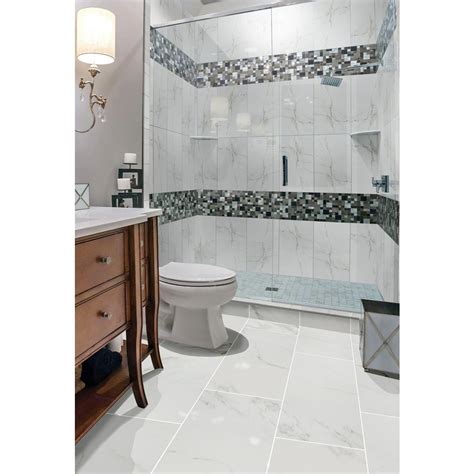We have 3 dedicated showrooms with displays in our new. Home Decorators Collection 12 in. x 24 in. Carrara Polished Porcelain Floor and Wall Tile (16 sq ...