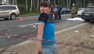 Shameful Russian Car Passenger Filmed Dancing And Posing Next To Dead