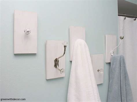 You can also use these techniques to remount towel rings, toilet paper holders and hooks too. Green With Decor - A DIY towel rack from old knobs and hooks