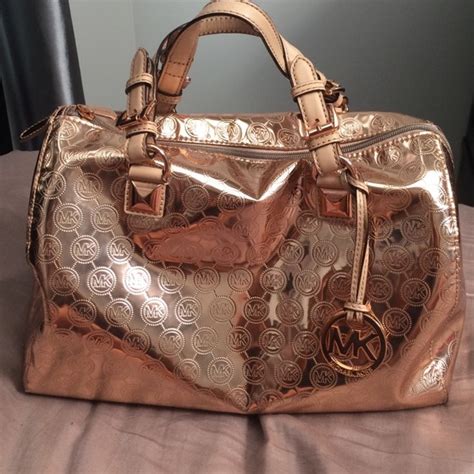 44 Off Michael Kors Handbags Authentic Rose Gold Mk Bag From Angela