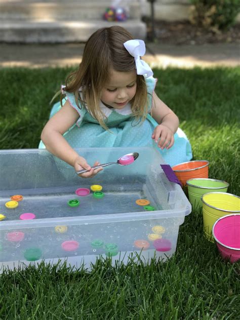 Try these outdoor diy activities specifically designed for babies and toddlers. Scooping and Sorting Lids for Toddlers - I Can Teach My Child!