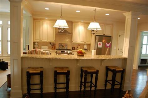 Black and white modern kitchen with wine rack. 13 Affordable Half Wall In Kitchen For Breakfast Bar Idea