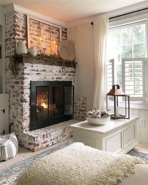 this rustic country fireplace is beautiful love the white brick it looks great in this space