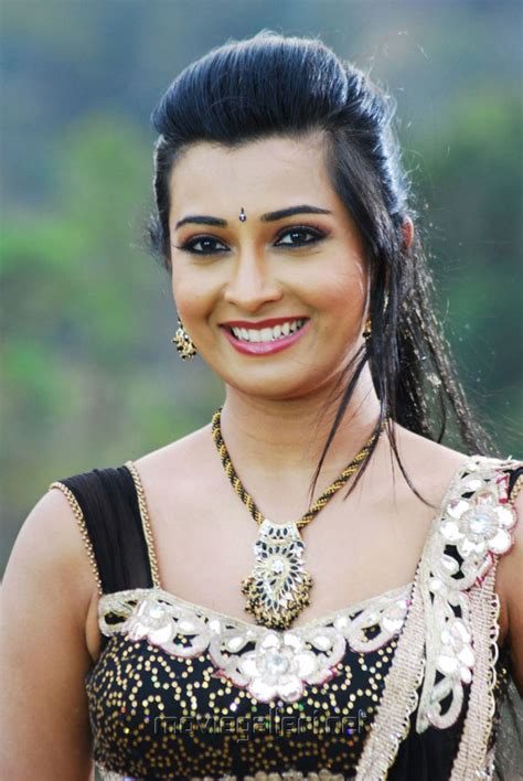 Radhika Pandit Hot Stills In Yuvakudu Movie