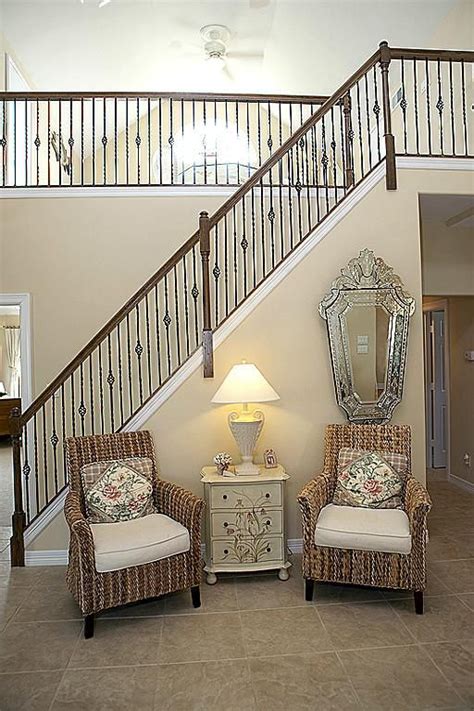 The wrought iron bed frames can be found its use in both of the classic style and the modern style. Iron Staircase and tile flooring and paint color for home update | Staircase design, Home, Stair ...