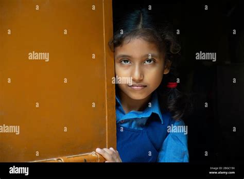 School Girl Standing At Door Stock Photo Alamy