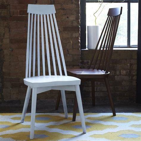Entertaining guests isn't just about serving delicious food—it also involves creating an ideal space for loved ones to gather. Spoke Dining Chair - west elm