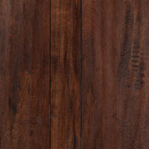 Laminate flooring simulates wood (or sometimes stone) with a photographic applique layer under a clear protective layer. Hampstead Winy Coffee Hand Scraped Random-Width Laminate ...