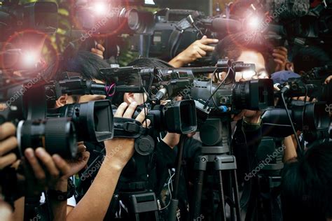 Press And Media Camera Video Photographer On Duty In Public New Stock