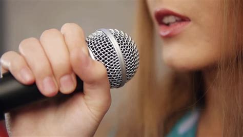 Close Up Of Singer Touching Microphone Singing Stock Footage Video
