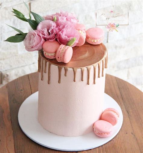 this pretty little pastel pink and rose gold drip cake was for a lovely ladies 60th birth