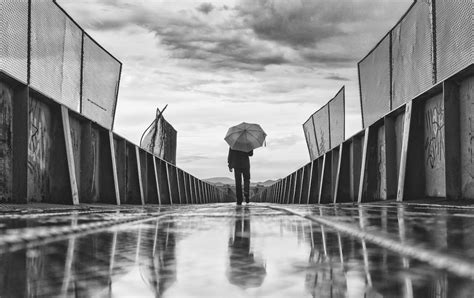 Man Walking In The Rain Pictures Download Free Images On Unsplash
