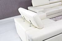 Divano letto con spalliera sagomata. Divano in pelle design Kennedy