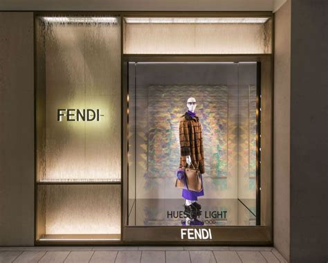 Our latest window installations with artist Chris Wood illuminate Fendi
