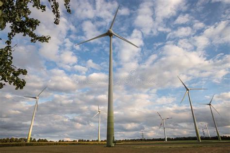 Modern Wind Turbines In Front Of A Cloudy Sky Stock Photo Image Of