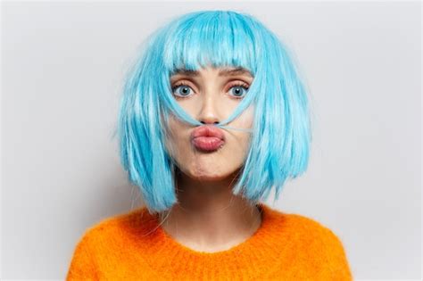 Premium Photo Studio Portrait Of Young Pretty Girl With Blue Hair In