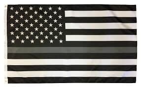 What do those colors symbolize? What does the black and white US flag with one purple ...