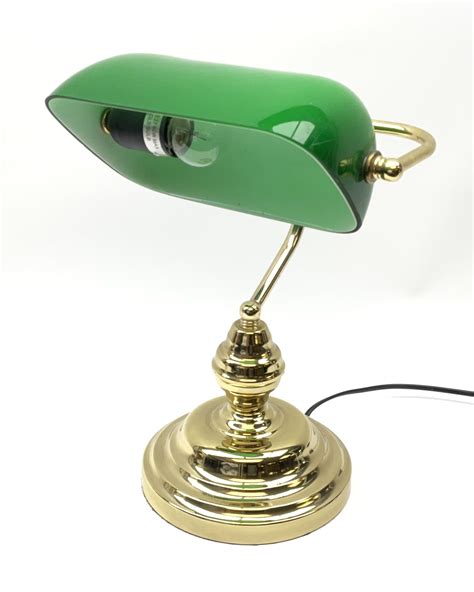 A Brass Bankers Desk Lamp With Adjustable Green Glass Shade And