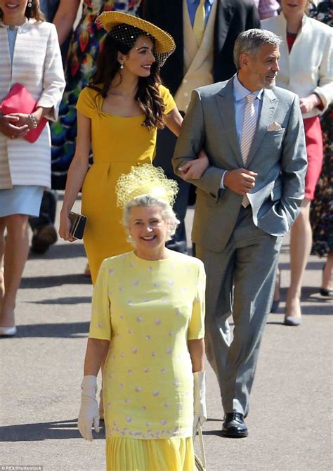 Amal clooney showed up for the royal wedding and looks set to give the bride a run for her money with her stunning mustard ensemble! Amal Clooney and husband George lead the best celebrity ...