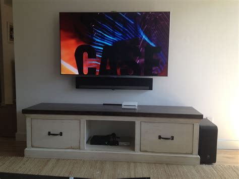 Maybe you would like to learn more about one of these? Sonos Sound Bar mounted directly to the wall right below ...