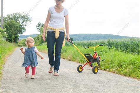 Mother And Daughter Walking Stock Image F0091403 Science Photo