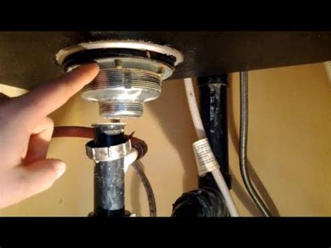 Undermount sinks are most often caulked into the counters with sealant, but larger ones may also have clips that hold them in place. How to Replace A Kitchen Sink Strainer - YouTube