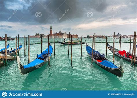 Gondolas In The Harbor Of Venice With San Giorgio Maggiore Island