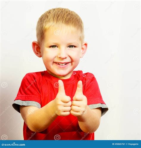 Little Boy Showing Thumb Up Success Hand Sign Gesture Stock Image