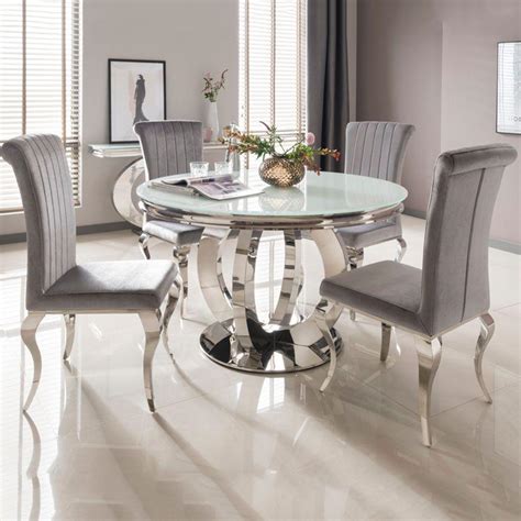The circular tabletops are made from smoked glass that help to add to the open silhouette. Ohio 130cm White Glass & Chrome Round Dining Table Only ...