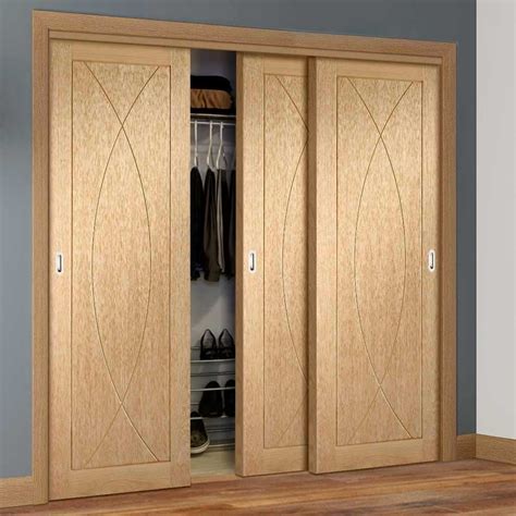 Three Sliding Maximal Wardrobe Doors And Frame Kit Pesaro Oak Flush