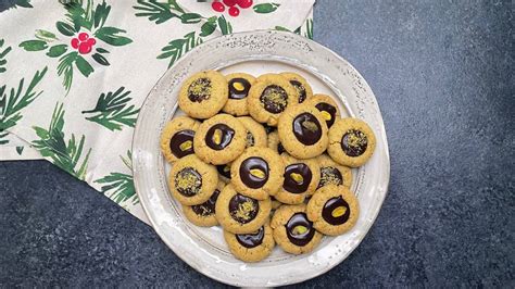 Pistachio Orange Thumbprint Cookies With Chocolate Ganache Recipe By Tasty